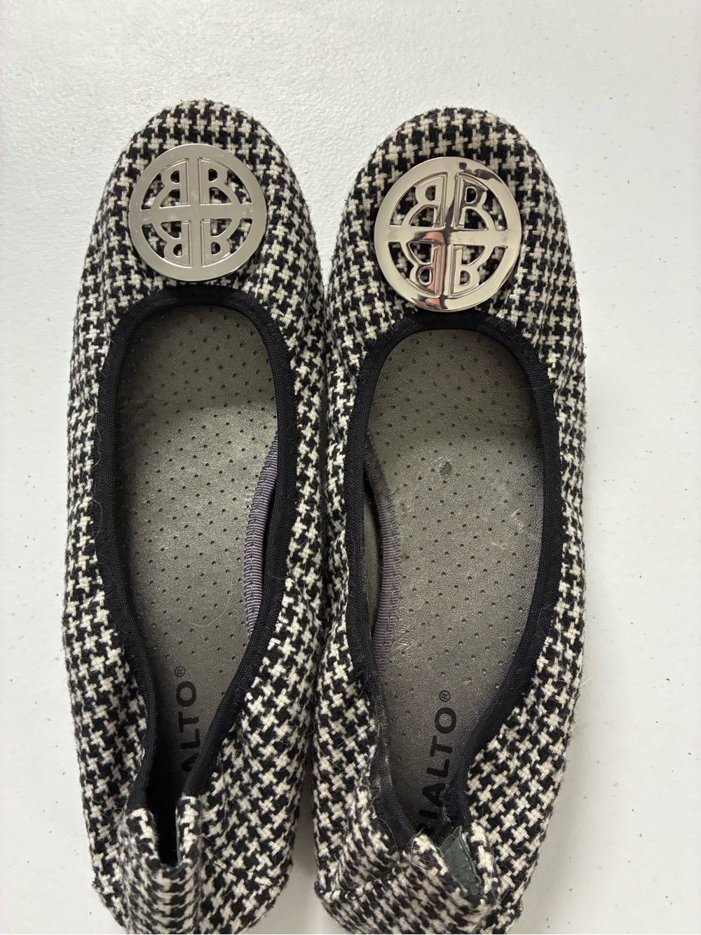 Rialto Black and White Houndstooth Ballet Flats with Silver Medallion
